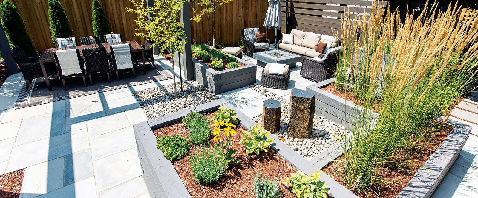 backyard landscape with patio seating area water feature