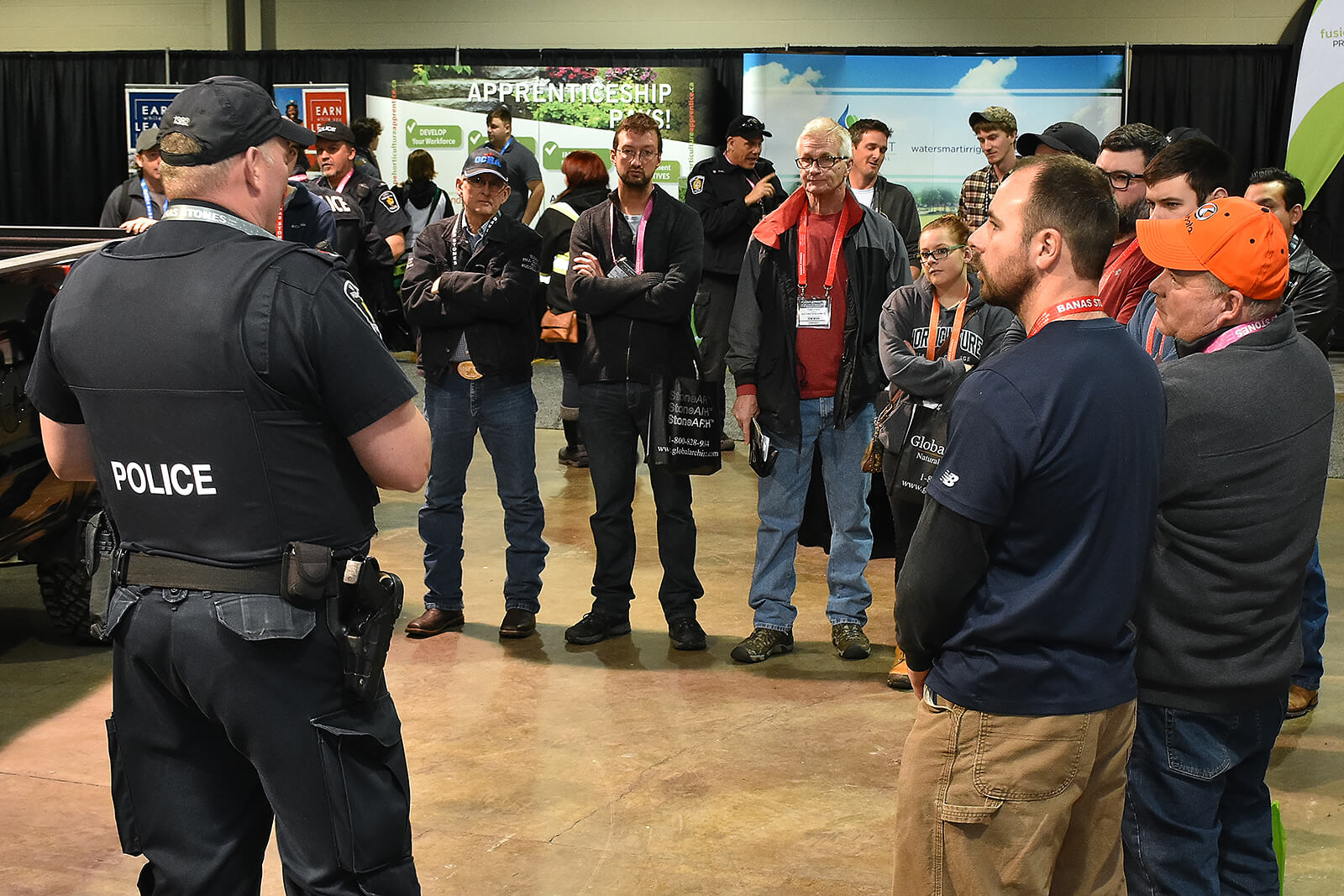 police officer taking questions from the crowd