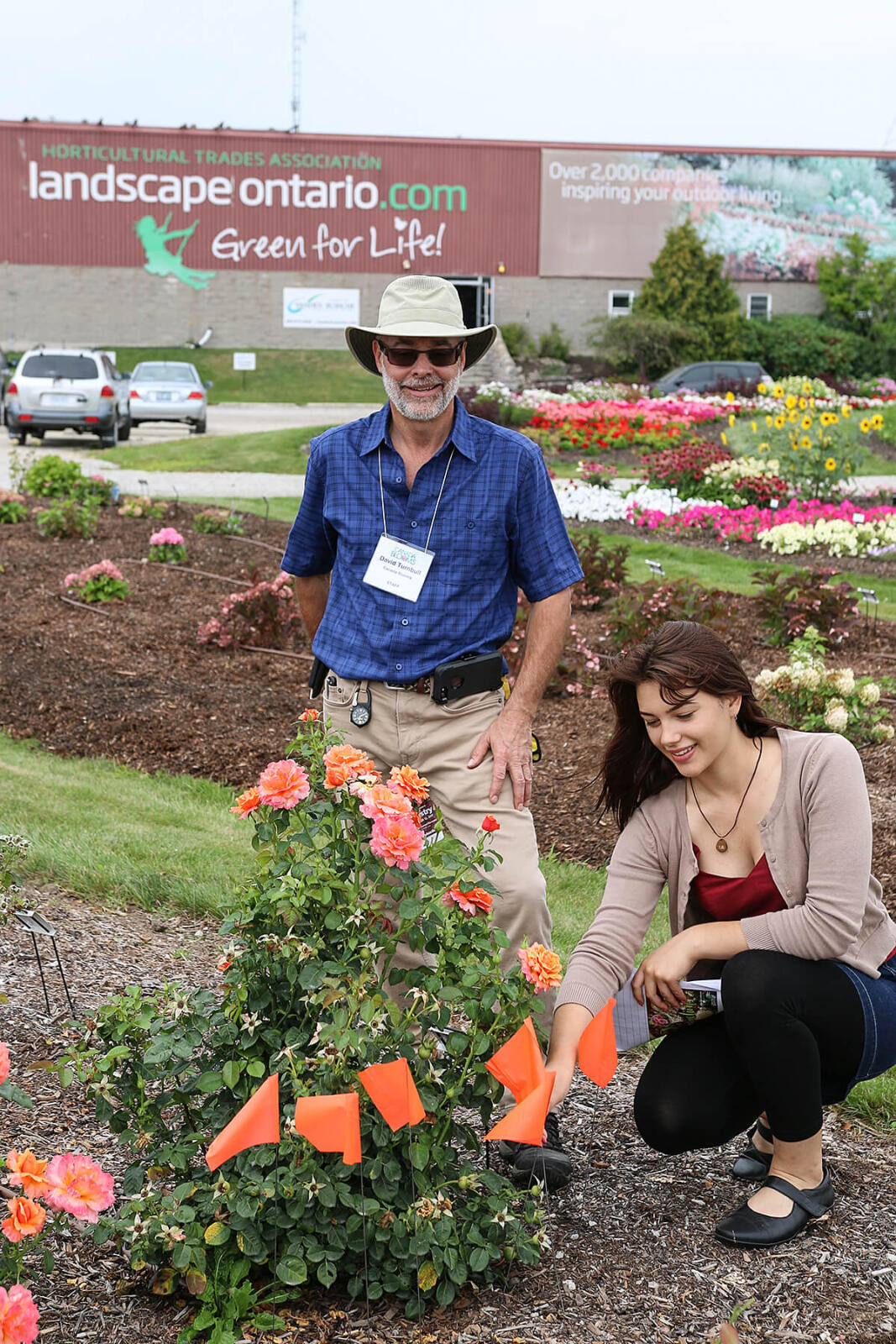 LO property manager David Turnbull helps part-time employee Lillian Jojart to tally up votes.