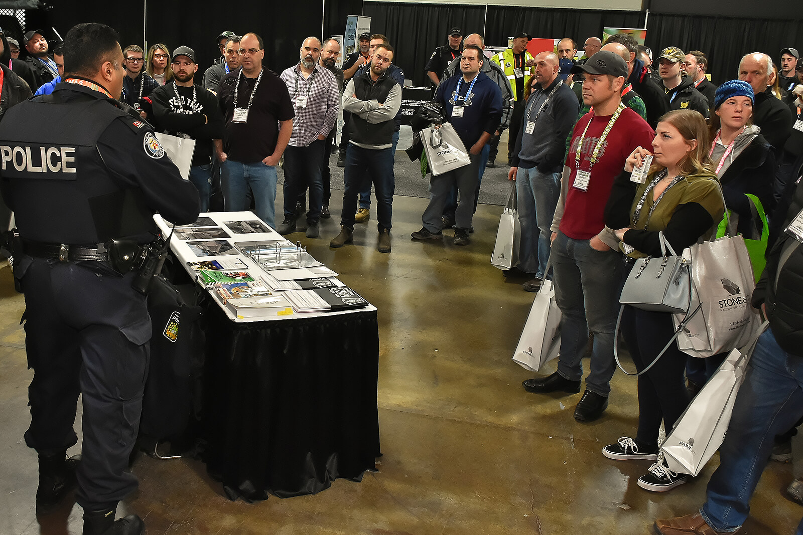 police officer taking questions from the crowd