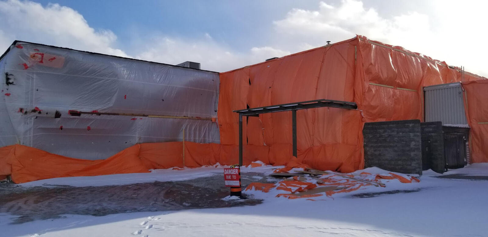 exterior of building tarped