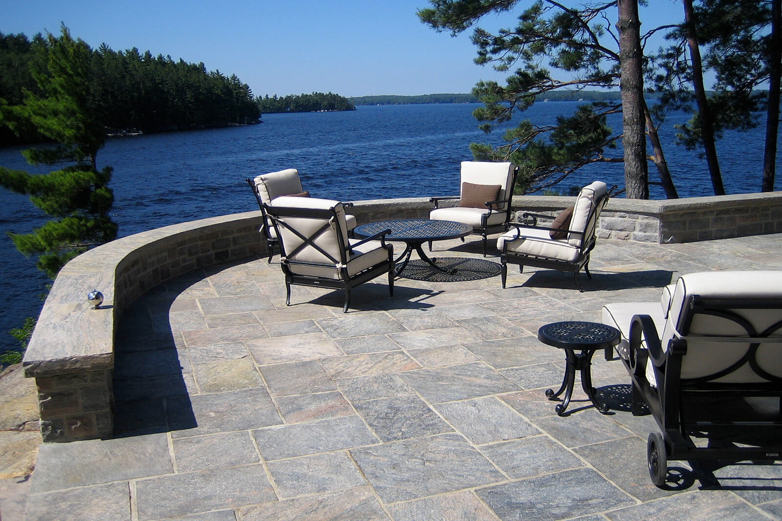 beautiful stone patio overlooking a northern ontario lake