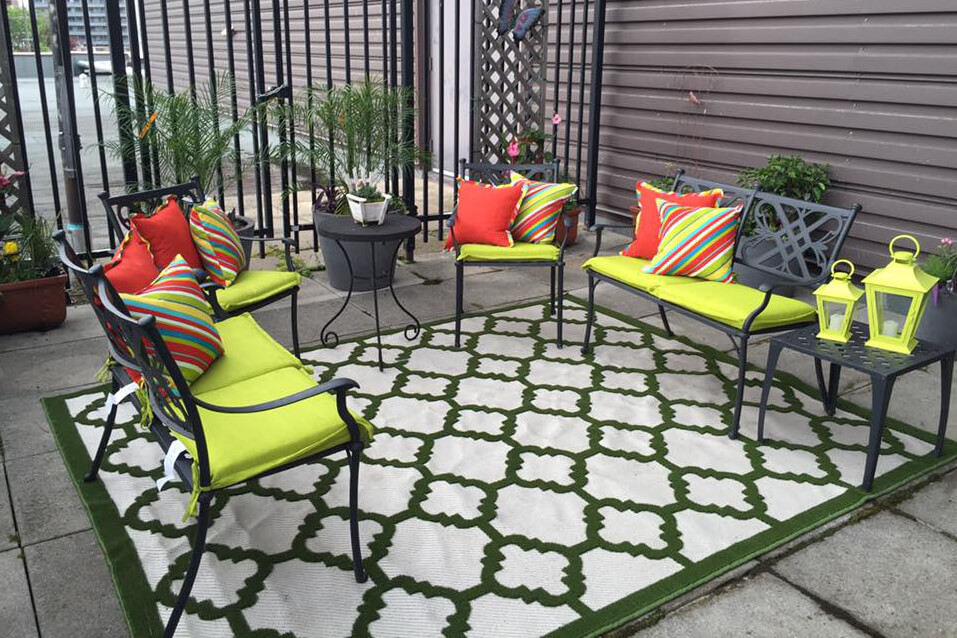 patio area with furniture and carpet