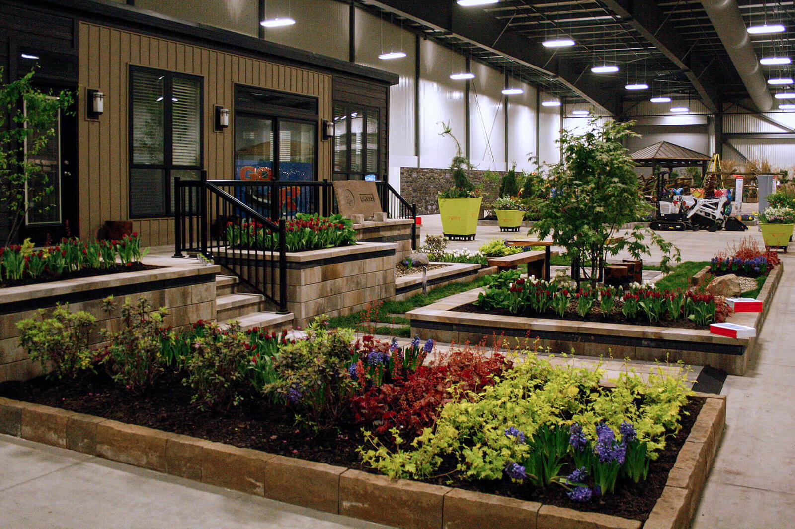 front yard garden with building in the background