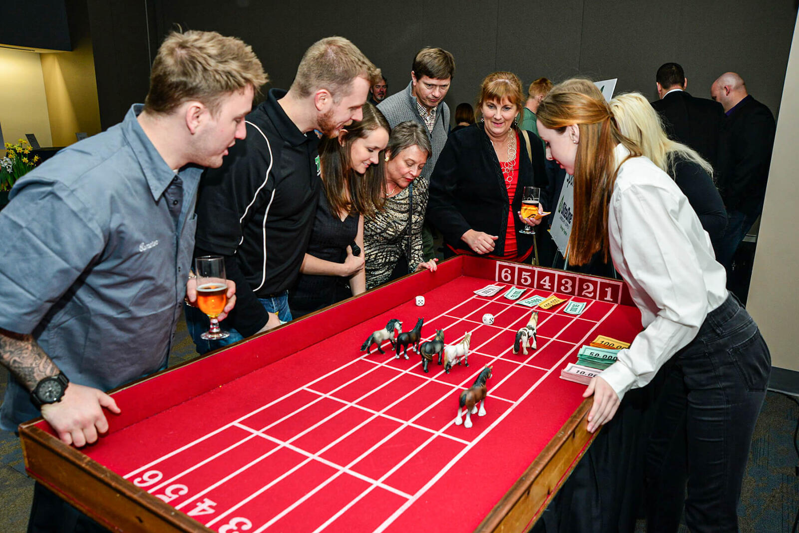 people playing at a casion table