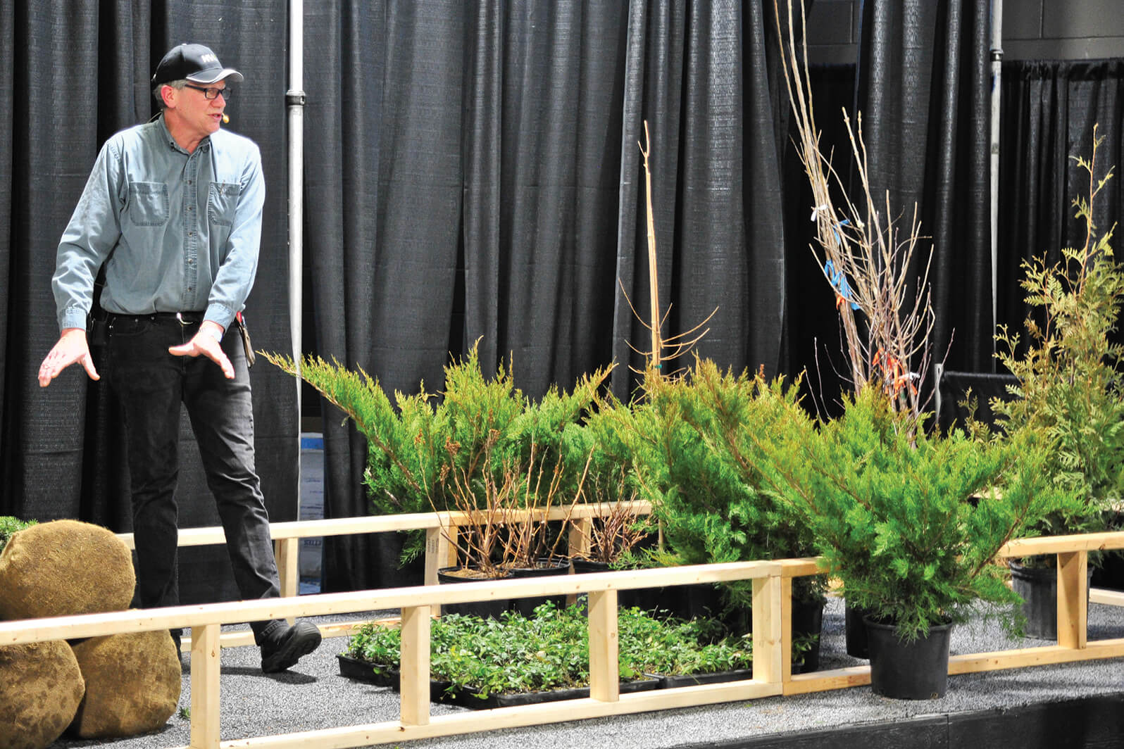 man demonstrating proper transportation of plant material