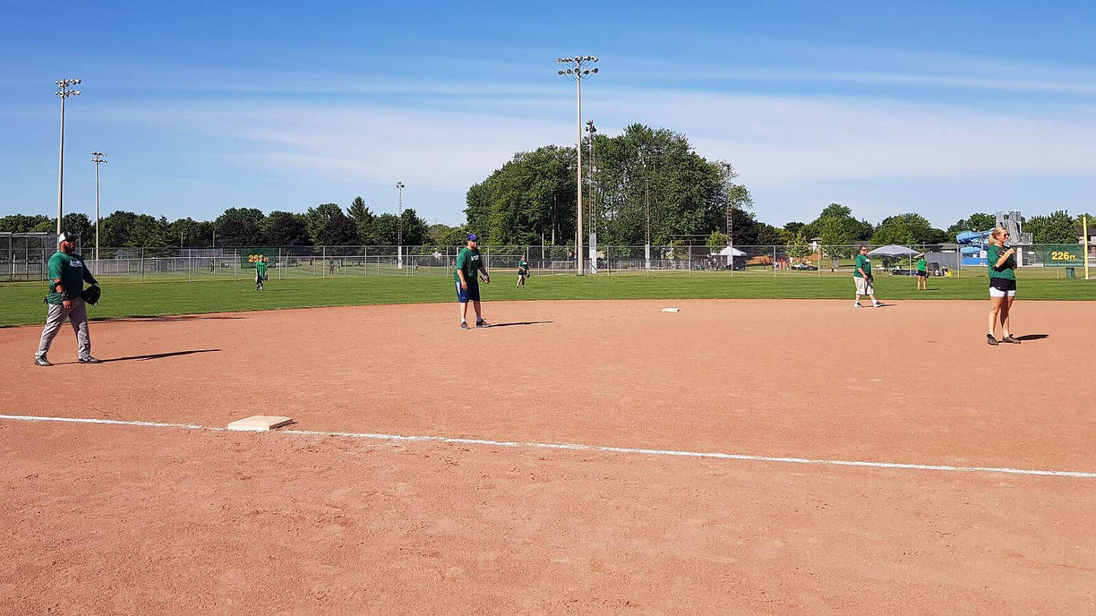 People on a baseball diamond