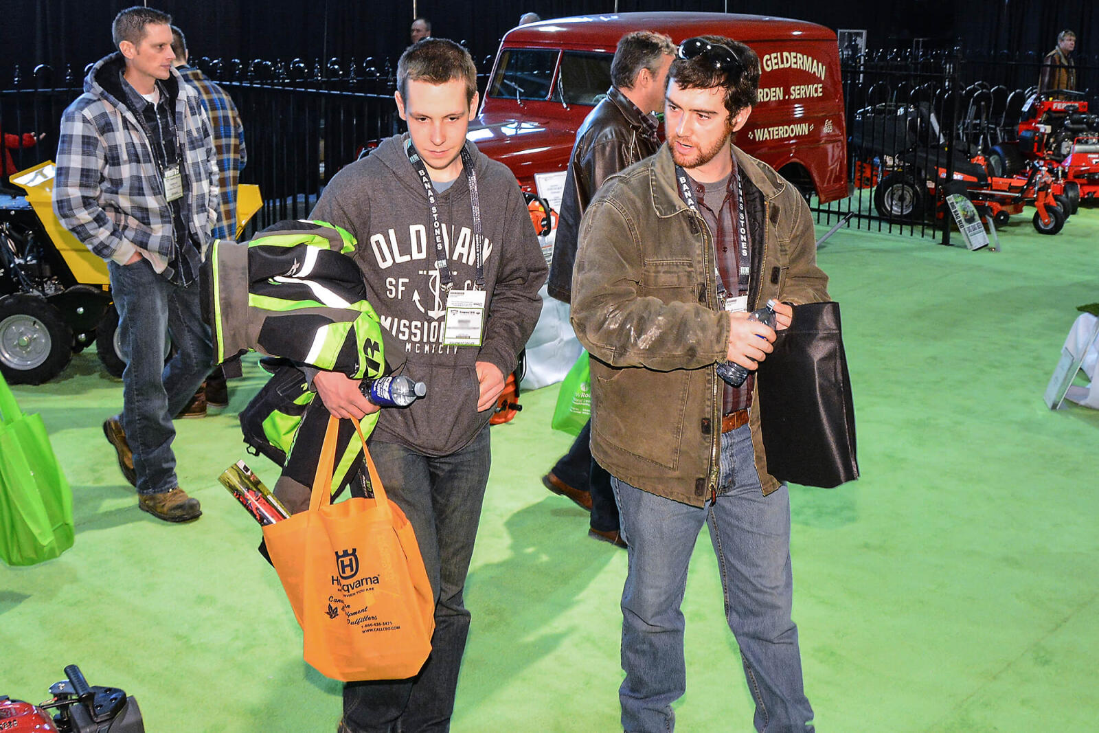 men looking at new products at a trade show