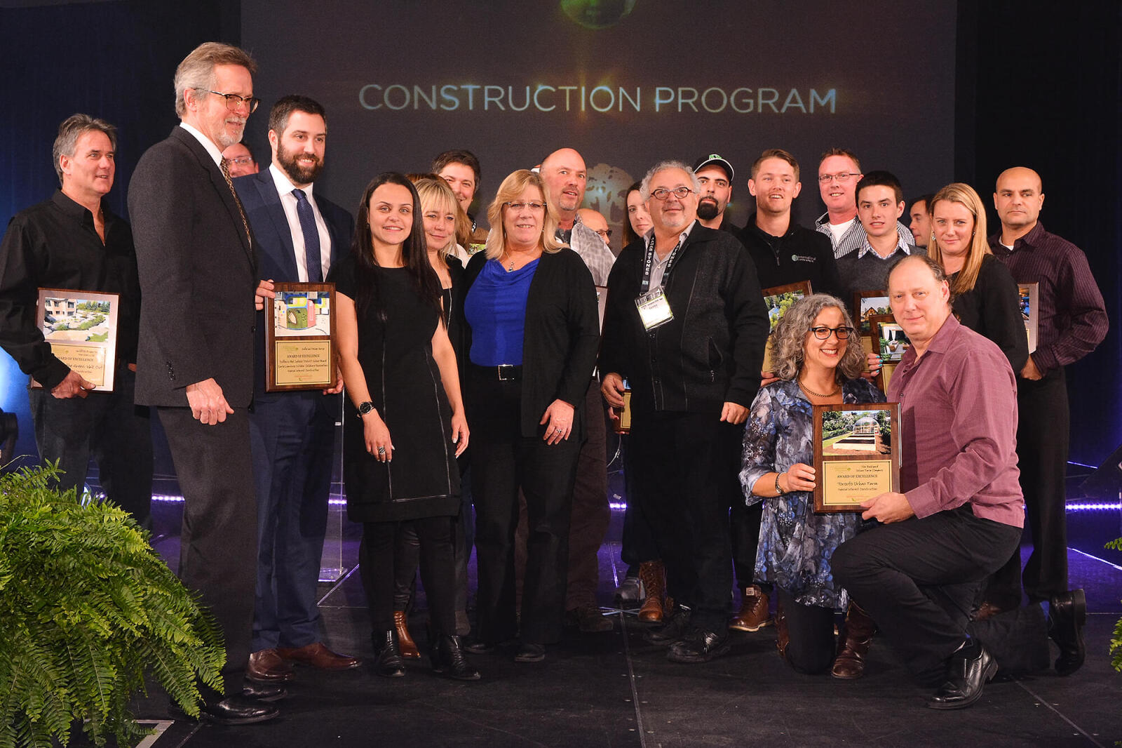 group of award winners on stage