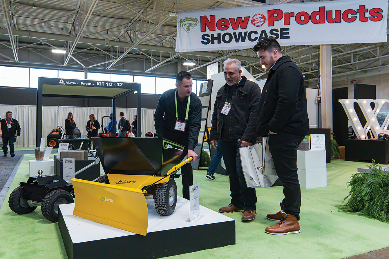 three men looking at a new product