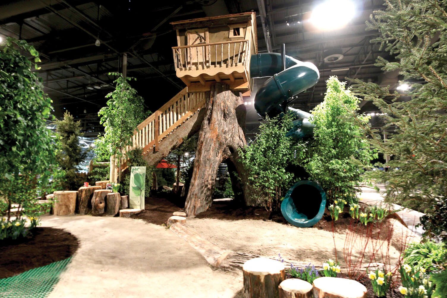 large natural playground and treehouse