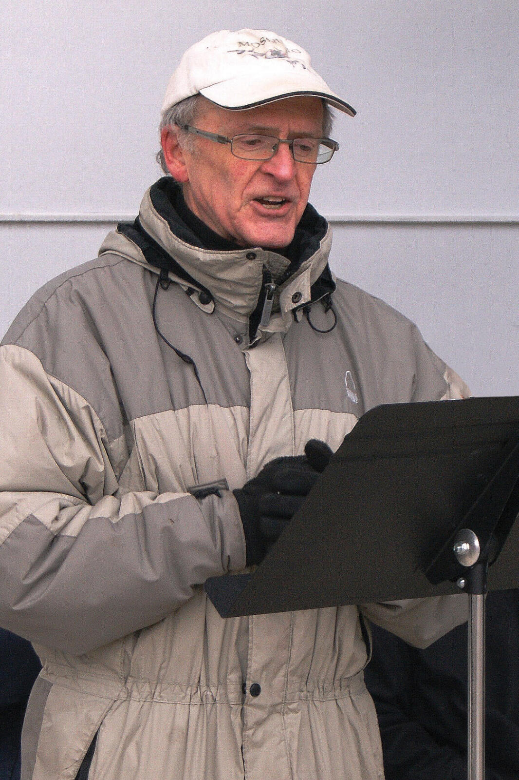 man speaking at a podium