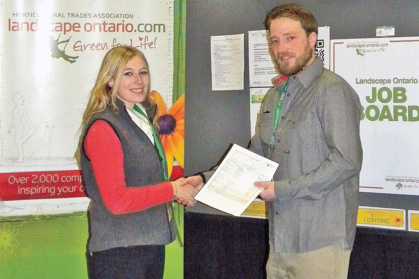 woman and man shaking hands