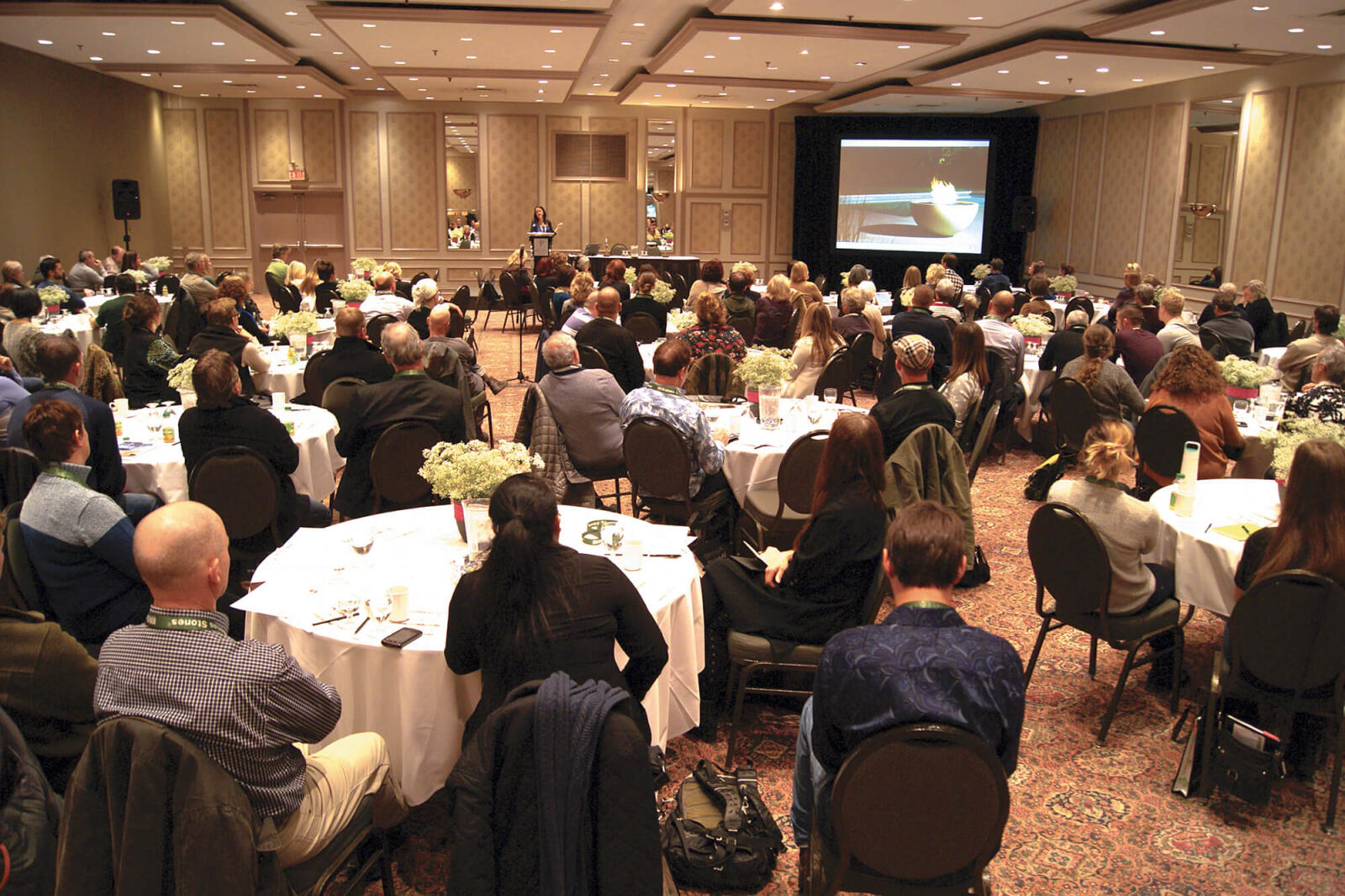 ballroom full of people attending a seminar