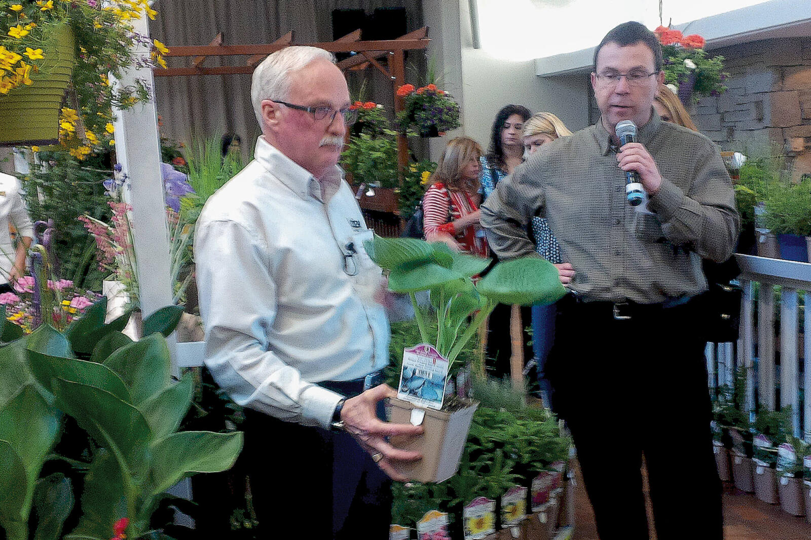 two men giving a gardening seminar