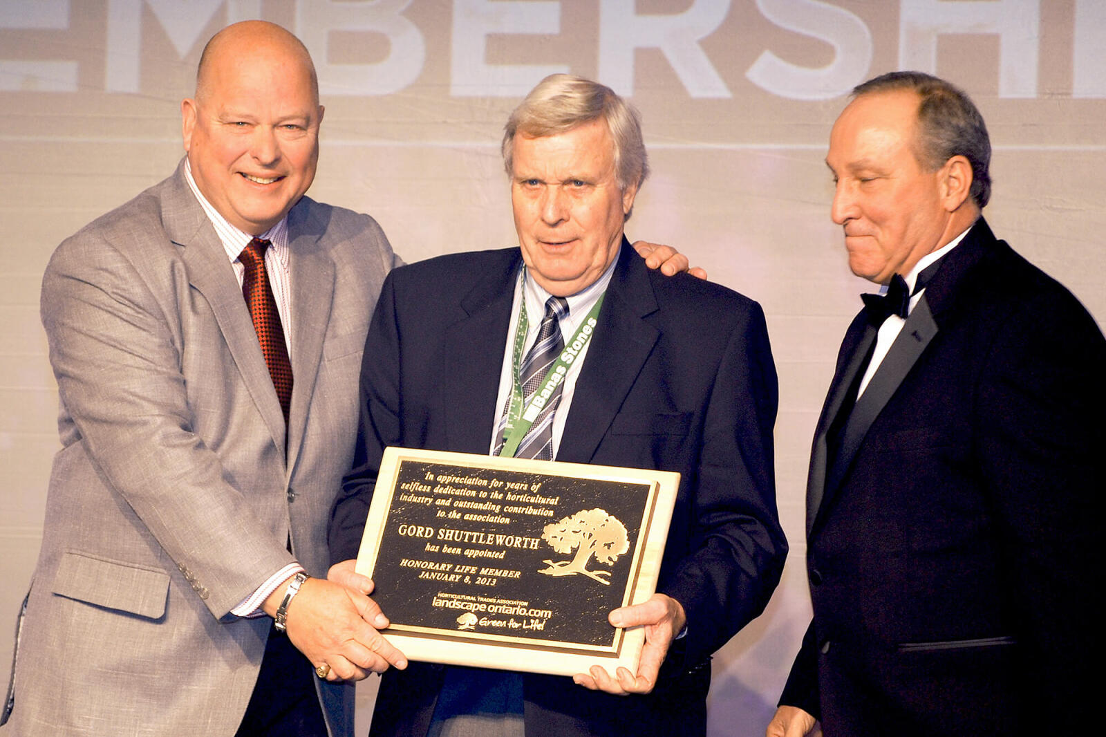 man accepting an award