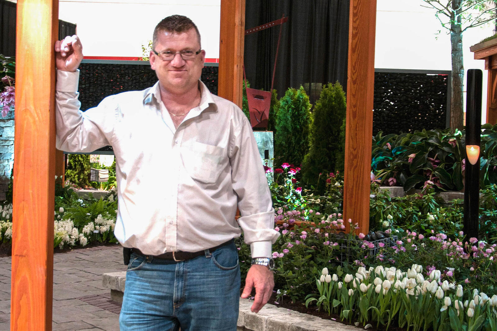 man in a feature garden