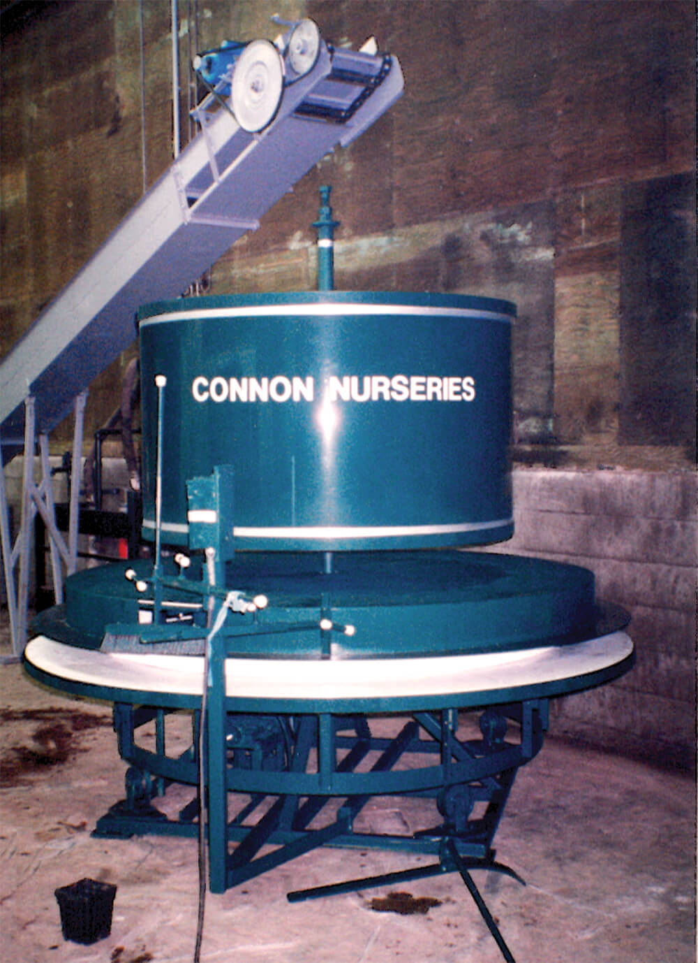 a blue potting machine
