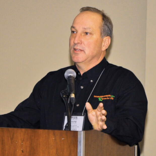 man at a podium speaking