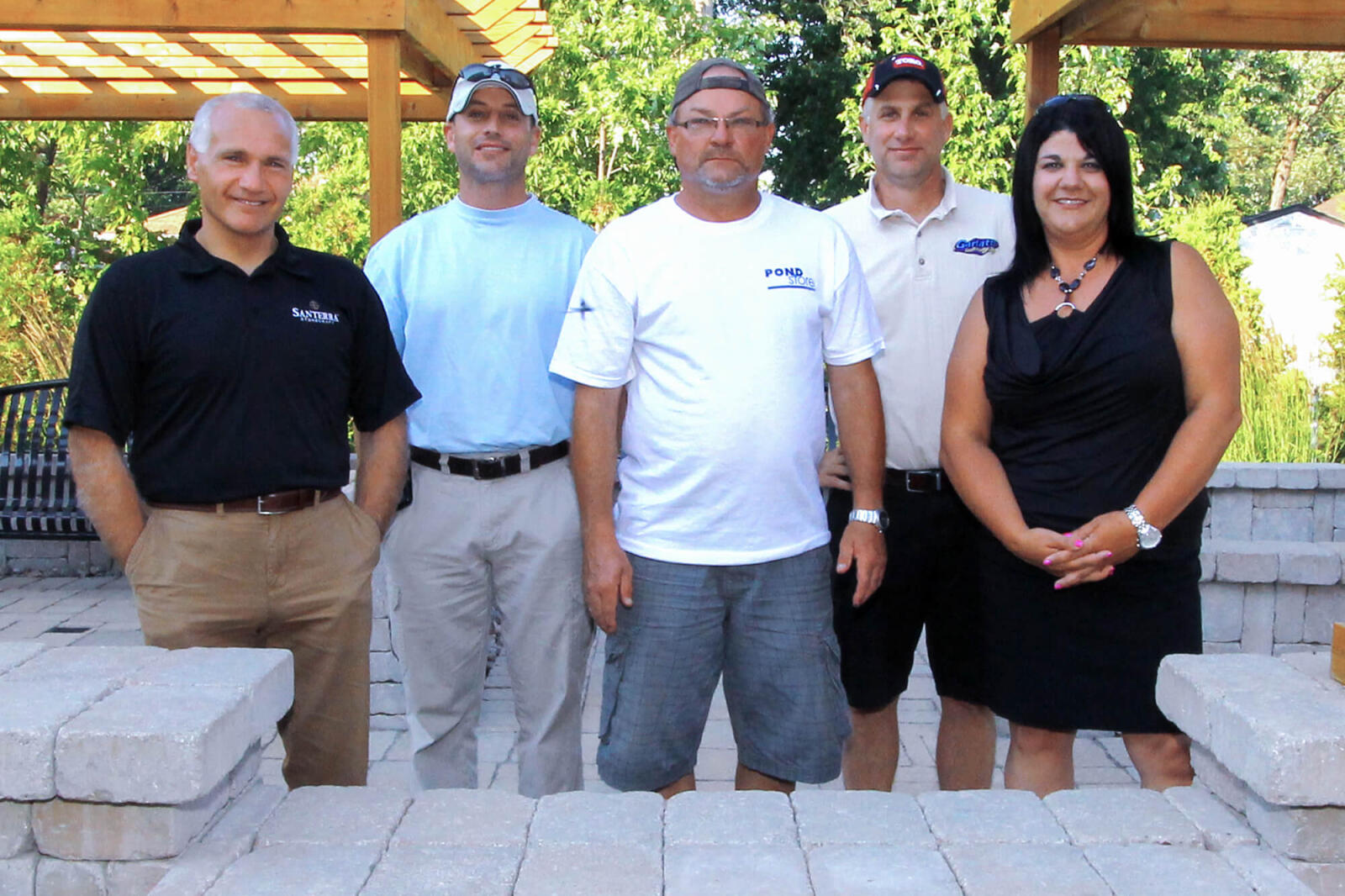 volunteers standing in a garden