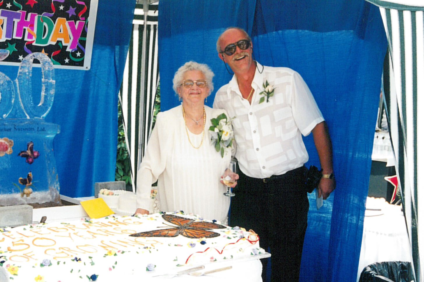 two peple and a cake