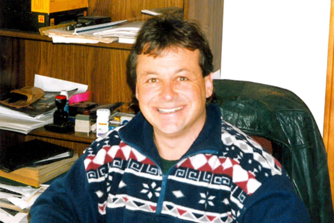 man sitting at a desk