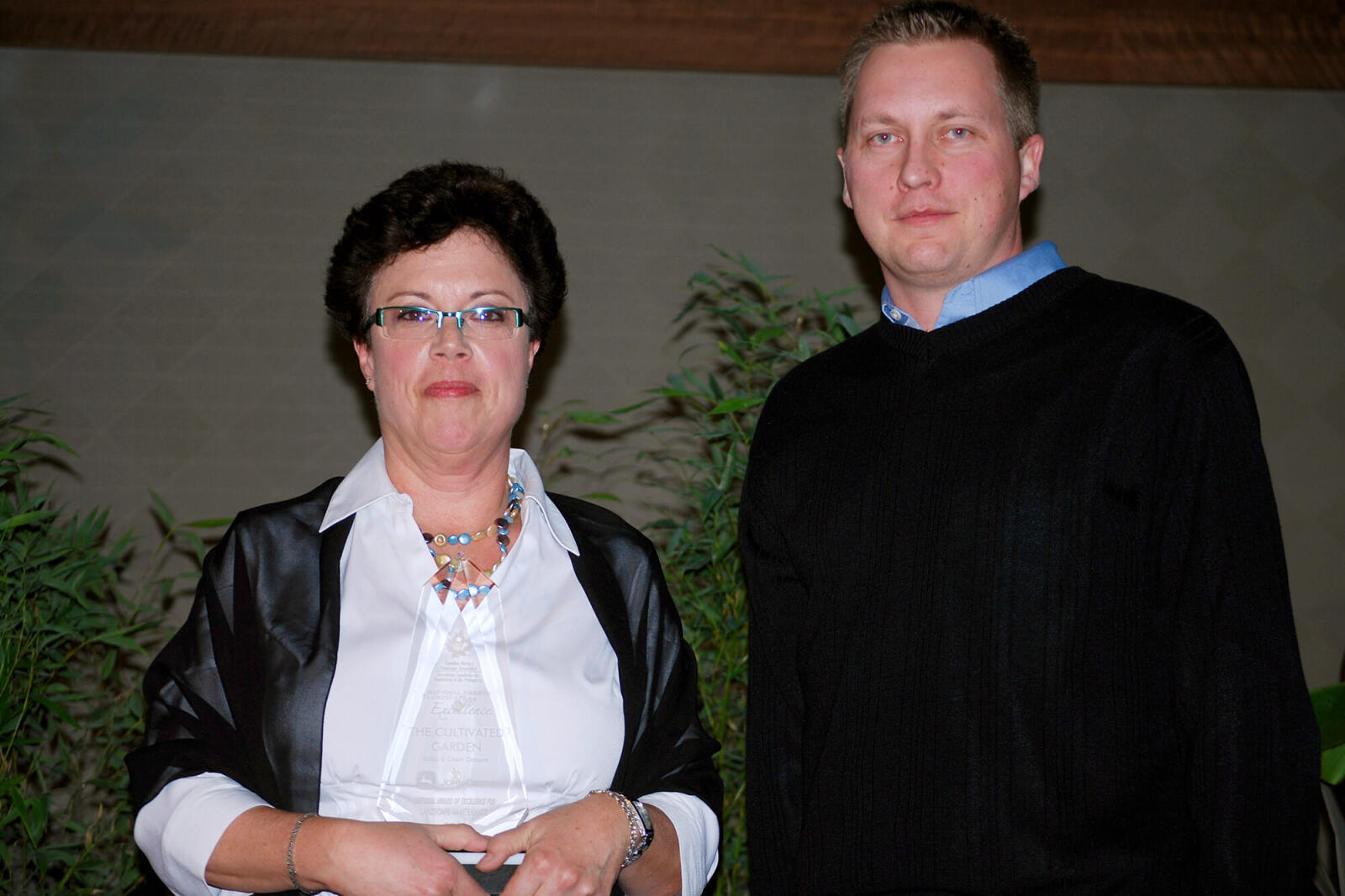 woman and man on stage