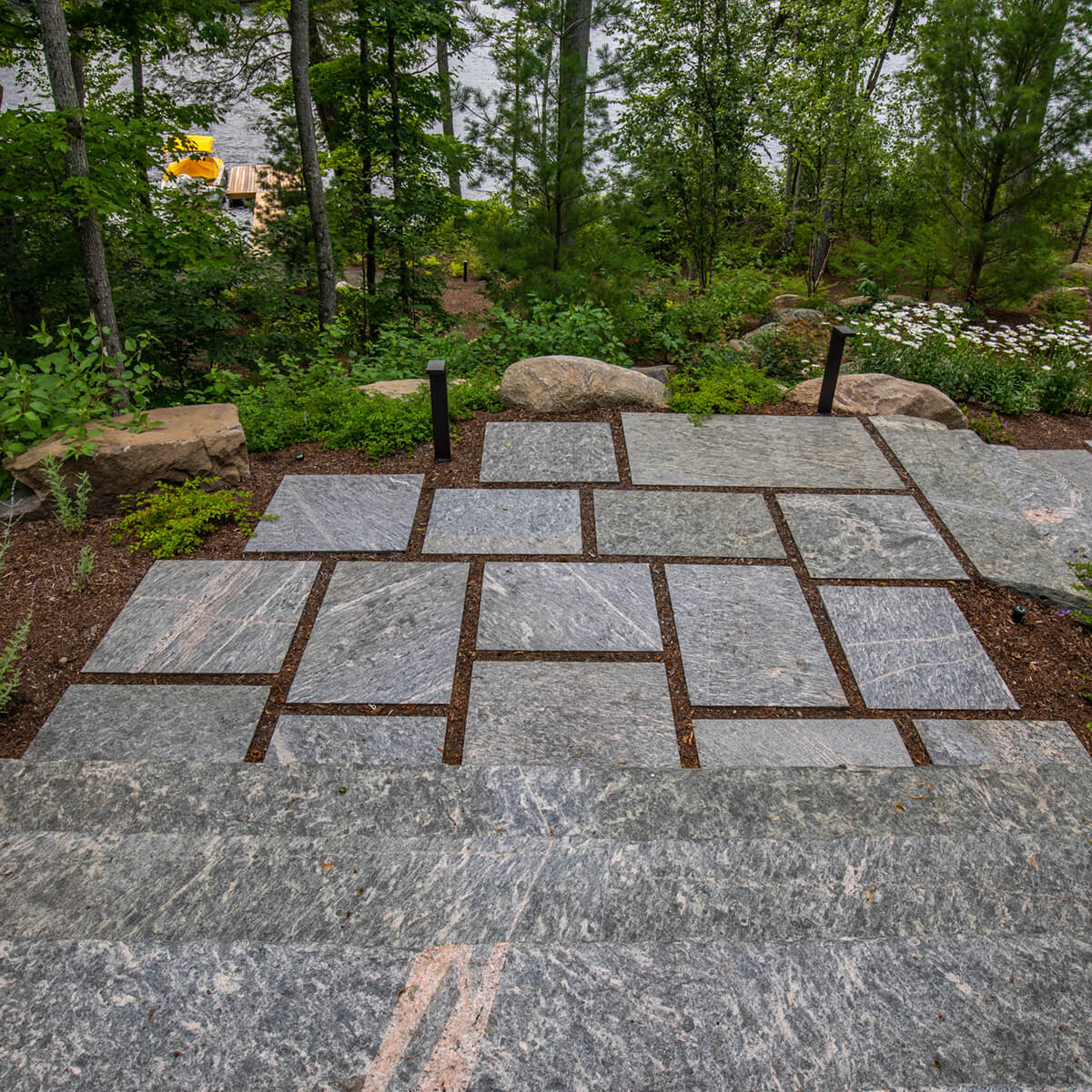 stone steps leading down to a lake