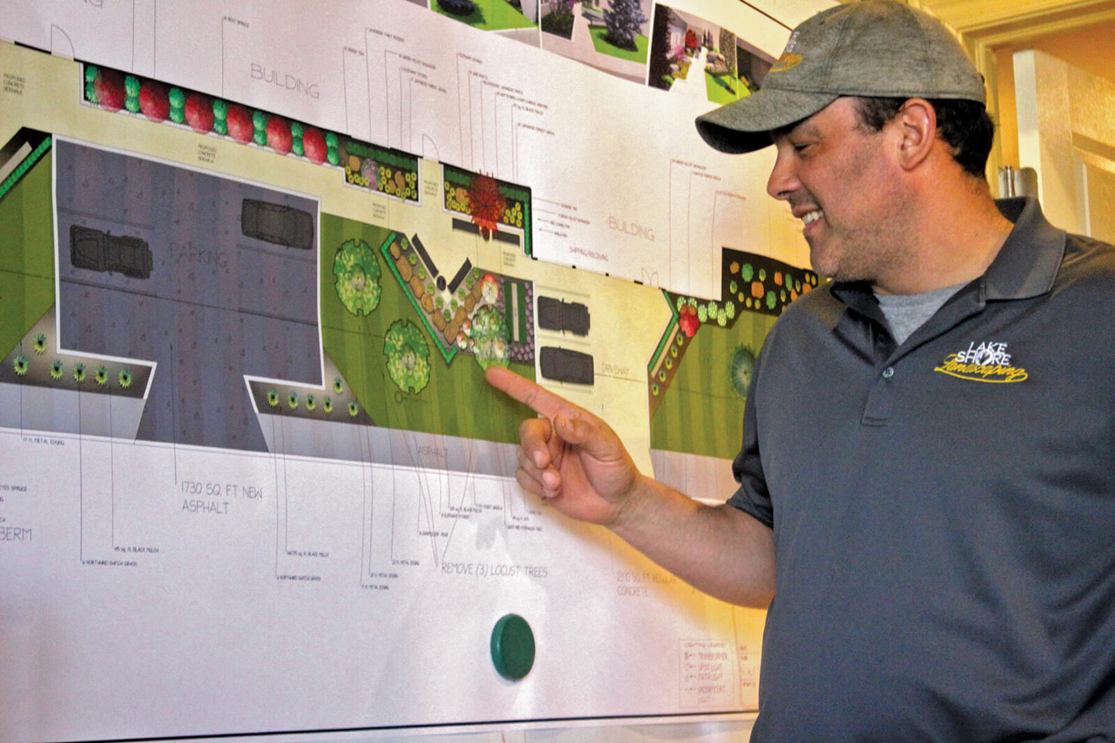man showing a landscape design