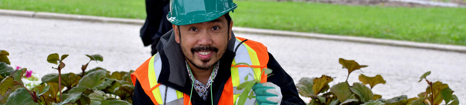 worker in a hard hat smiling