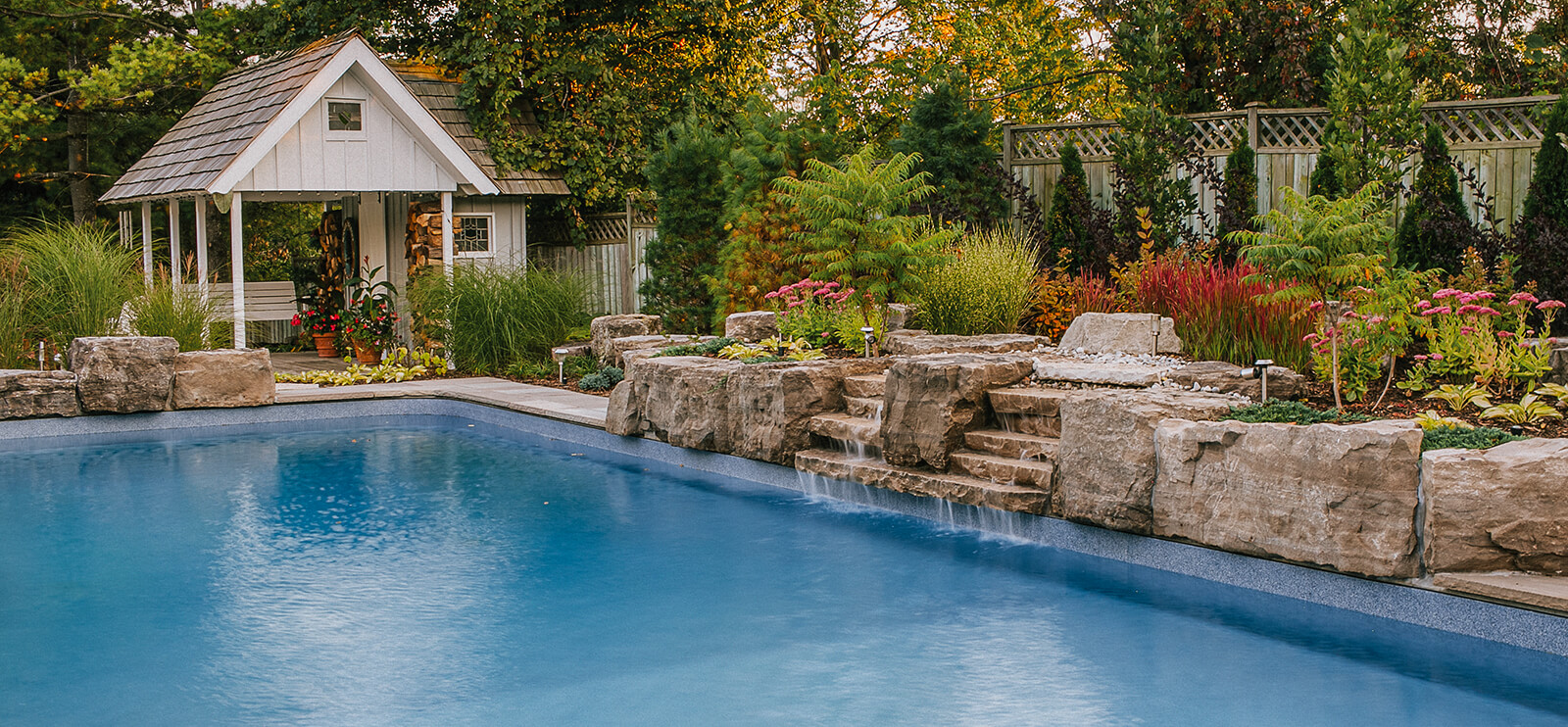 pool with natural stone waterfall