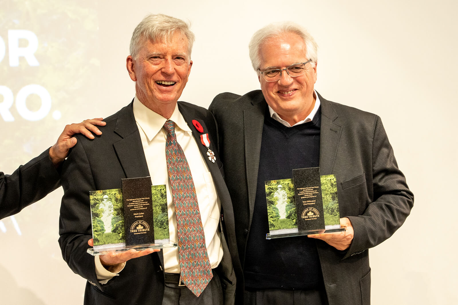 two men receiving awards