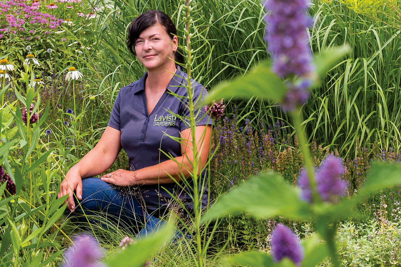 woman sitting in a natural garden