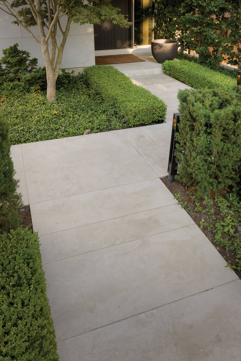 stone path to a front door of a house