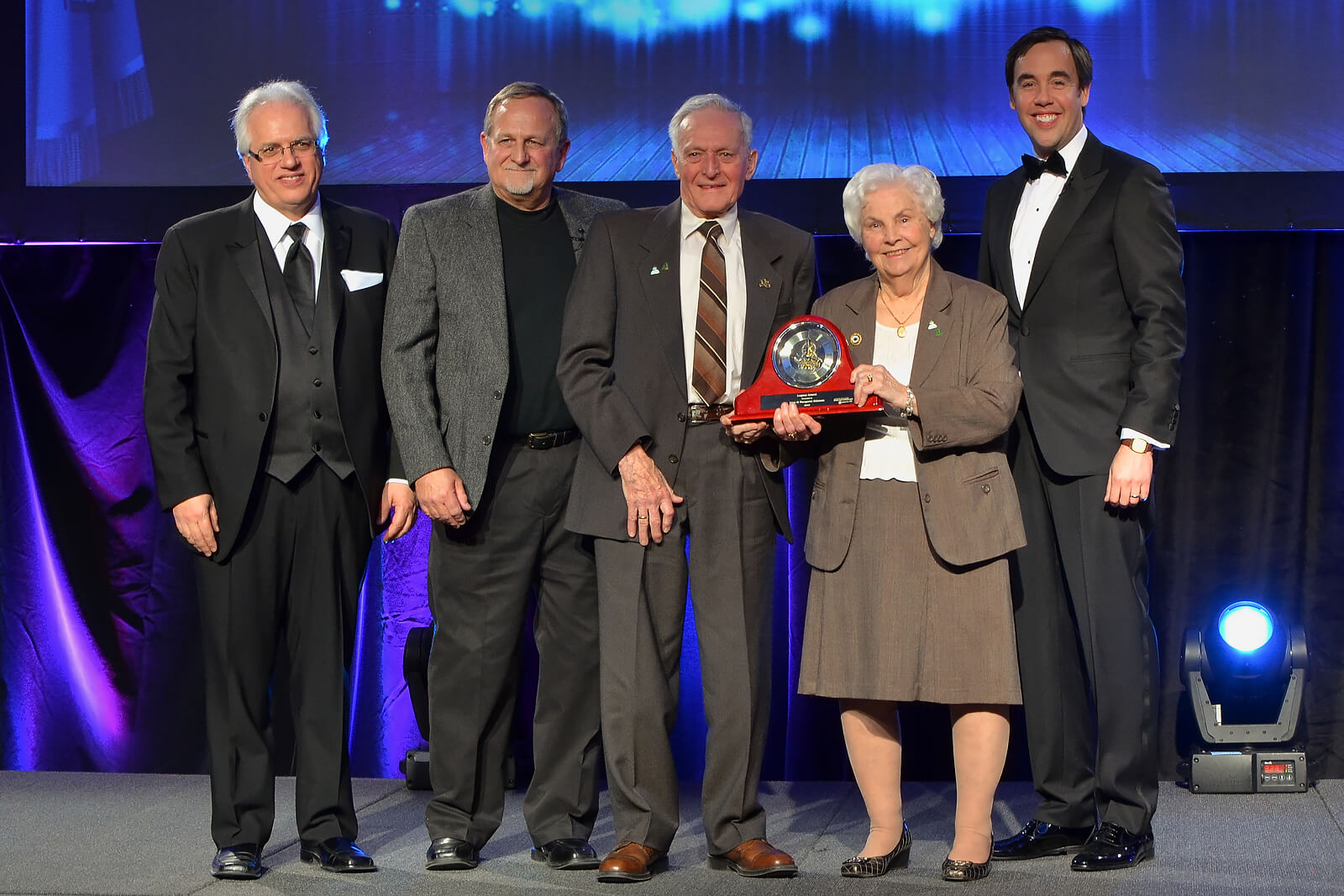 Presenter on stage at a trade show