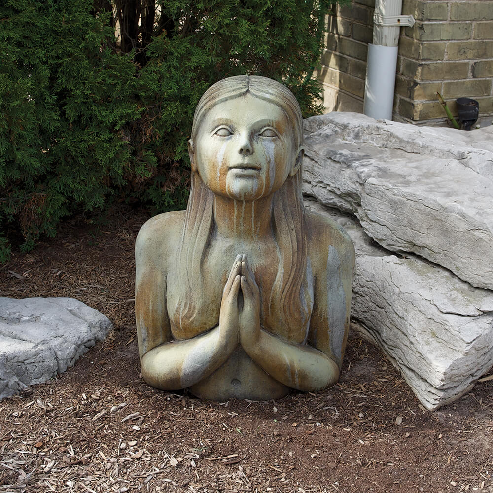angel statue in a garden