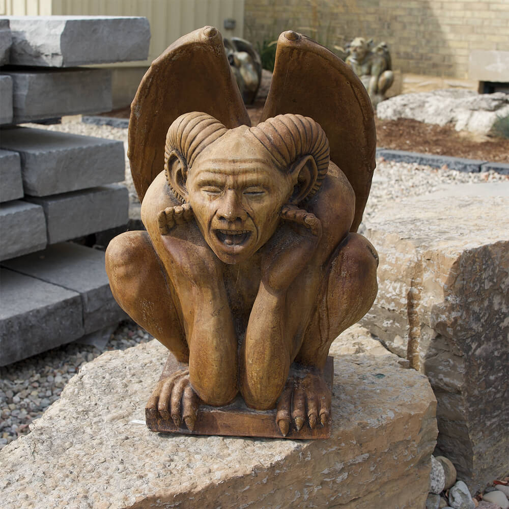 gargoyle statue on stone