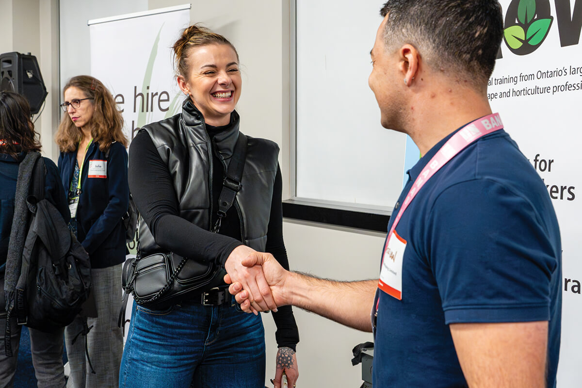man and woman shaking hands