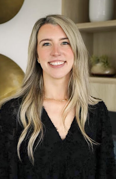 young blond woman smiling