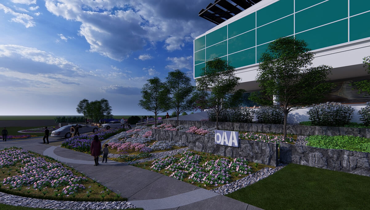 computer rendering of a large office building with extensive gardens