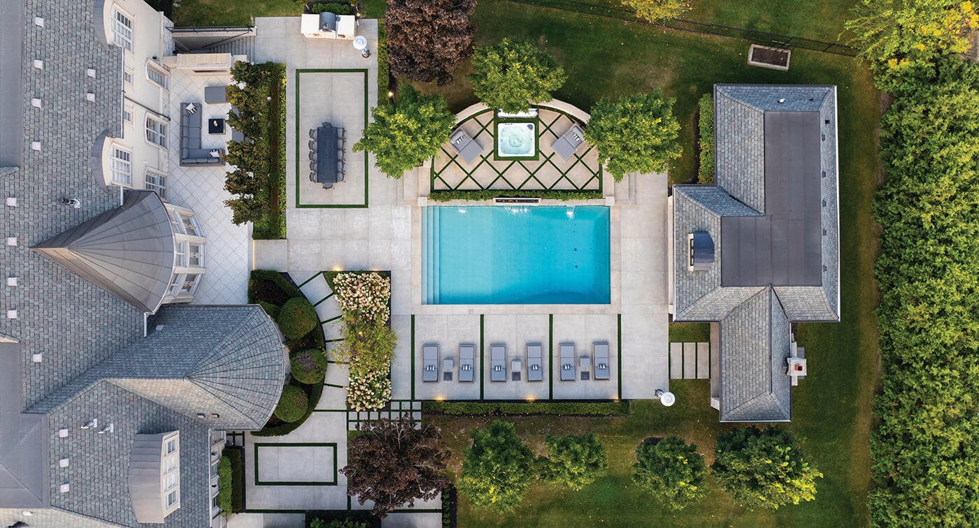 an aerial shot of a backyard property