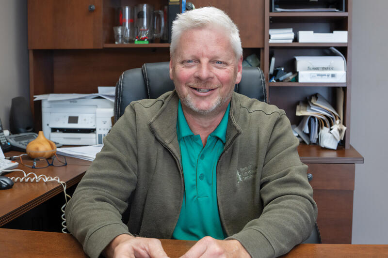 Richard Burch at desk