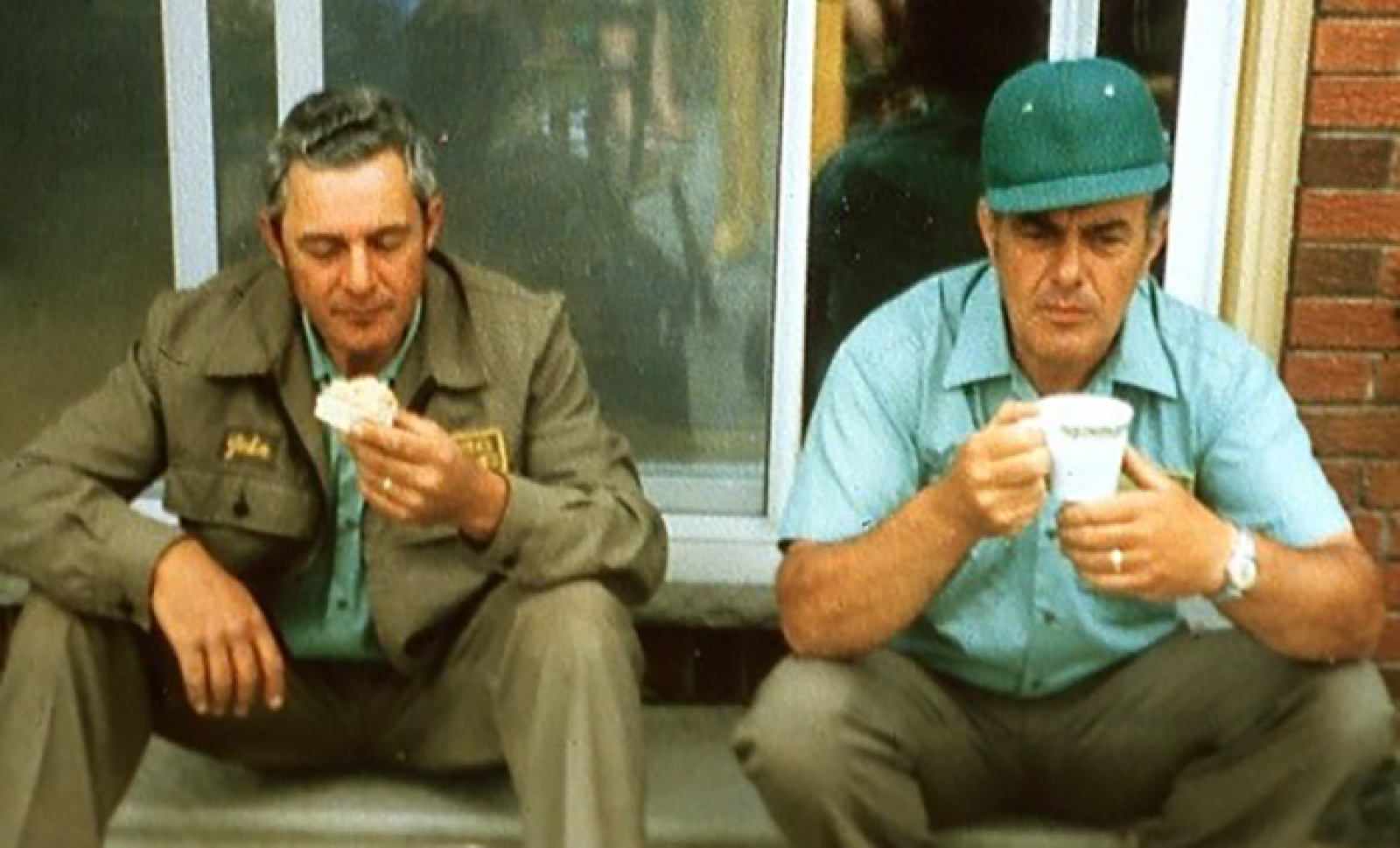 John, left, and David Bakker take a coffee break sometime in early 1970s. John, who passed away in 2012, is wearing the uniform worn by employees at the time. 