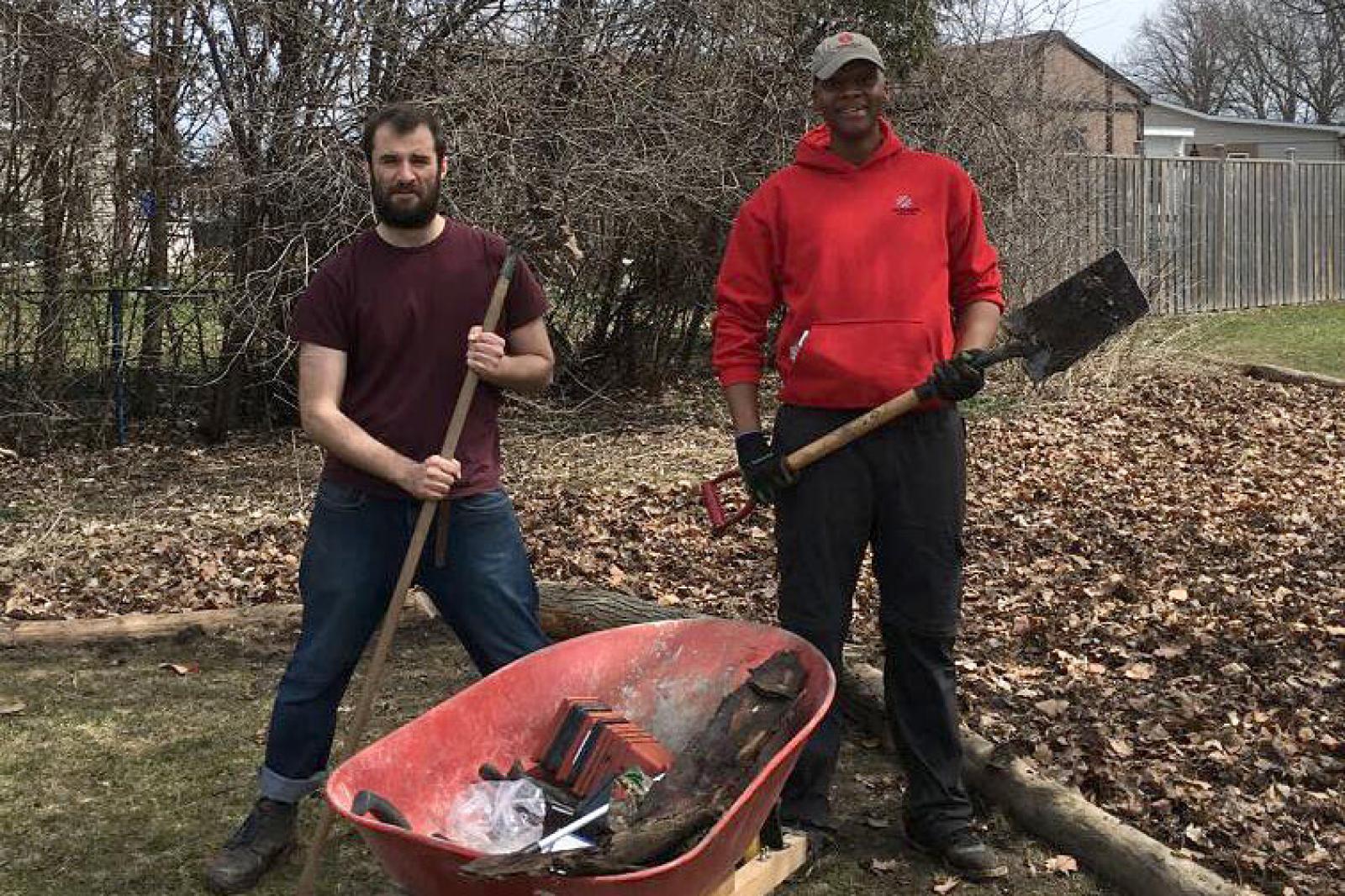 Fanshawe Colleges students, Geoffrey Trenholm Tobias Edwards and Lisa Norton (below) help with the clean up of the park.