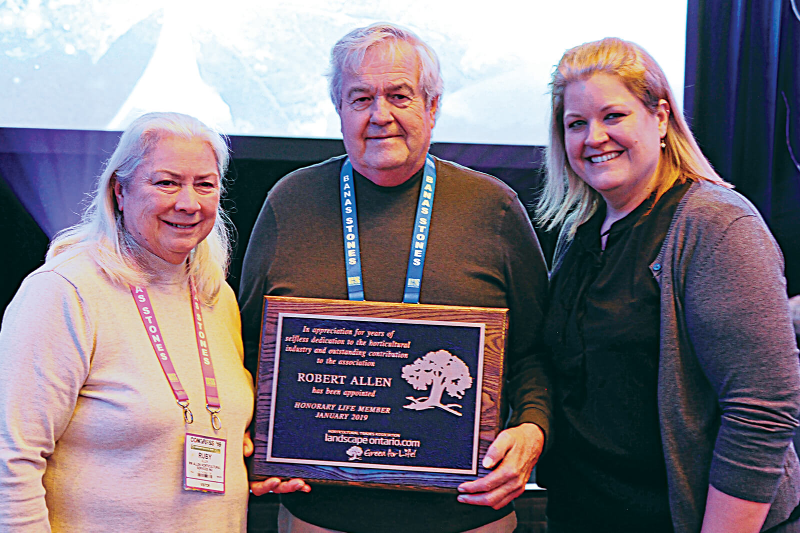 Bob Allen (centre), flanked by wife, Ruby and daughter, Heather.