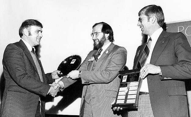 Waterloo Chapter president, Howard Gallup (left), accepts the first Membership Challenge Award back in 1979 from LO Executive Director, Dennis Souder, as chapter member, John Wright looks on.