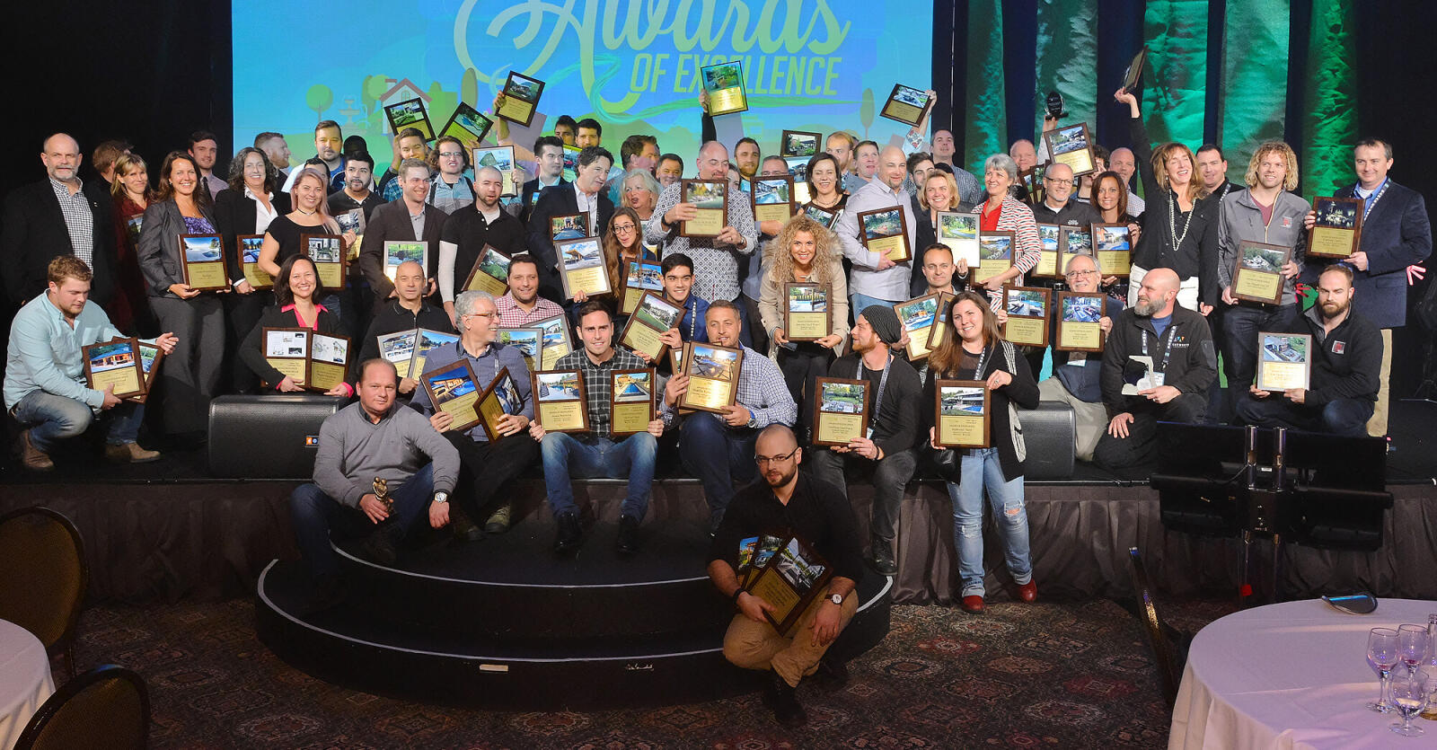 All award winners gathered on stage at the conclusion of the awards ceremony.