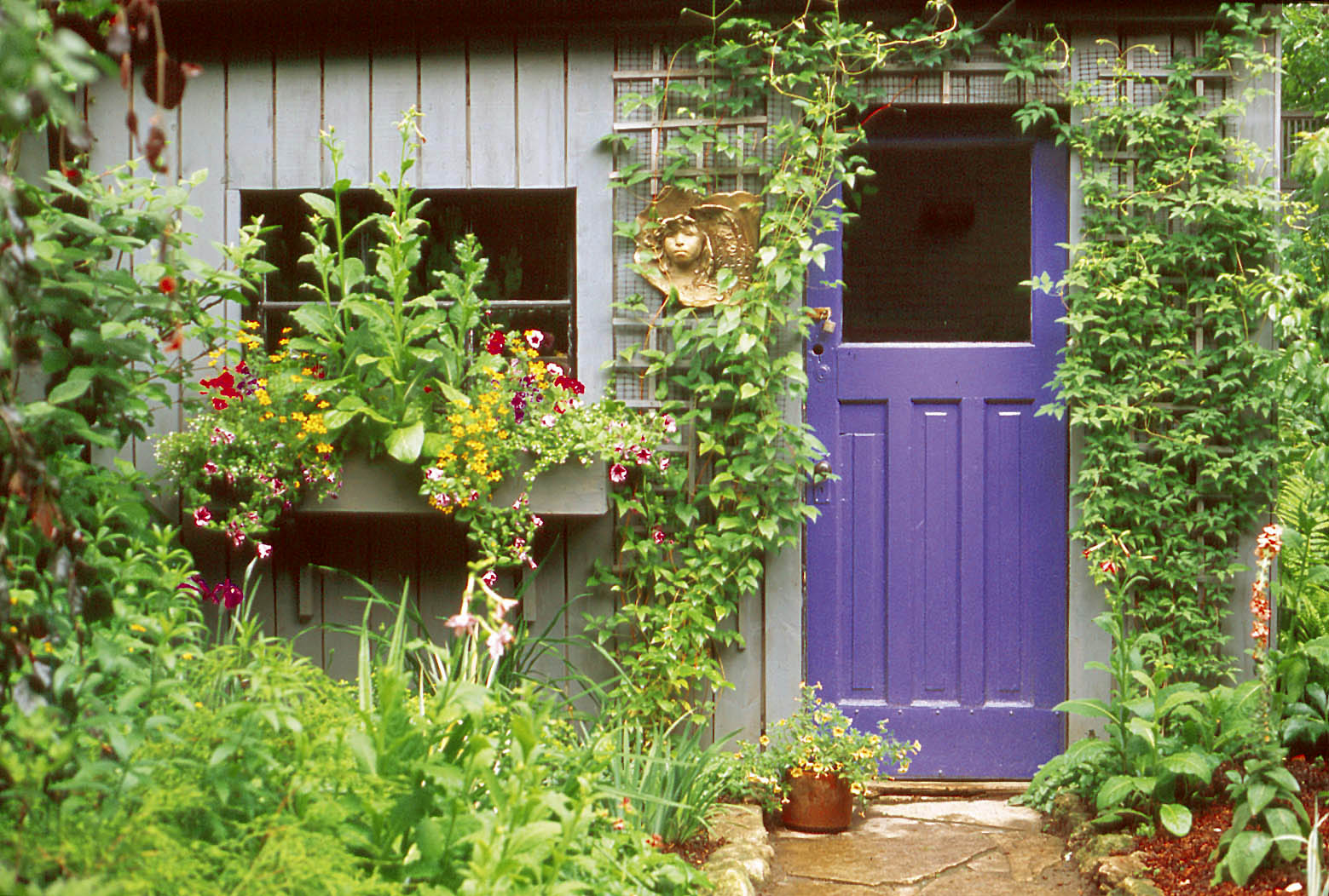 A gardener sensitive to blue's accent power painted this door.