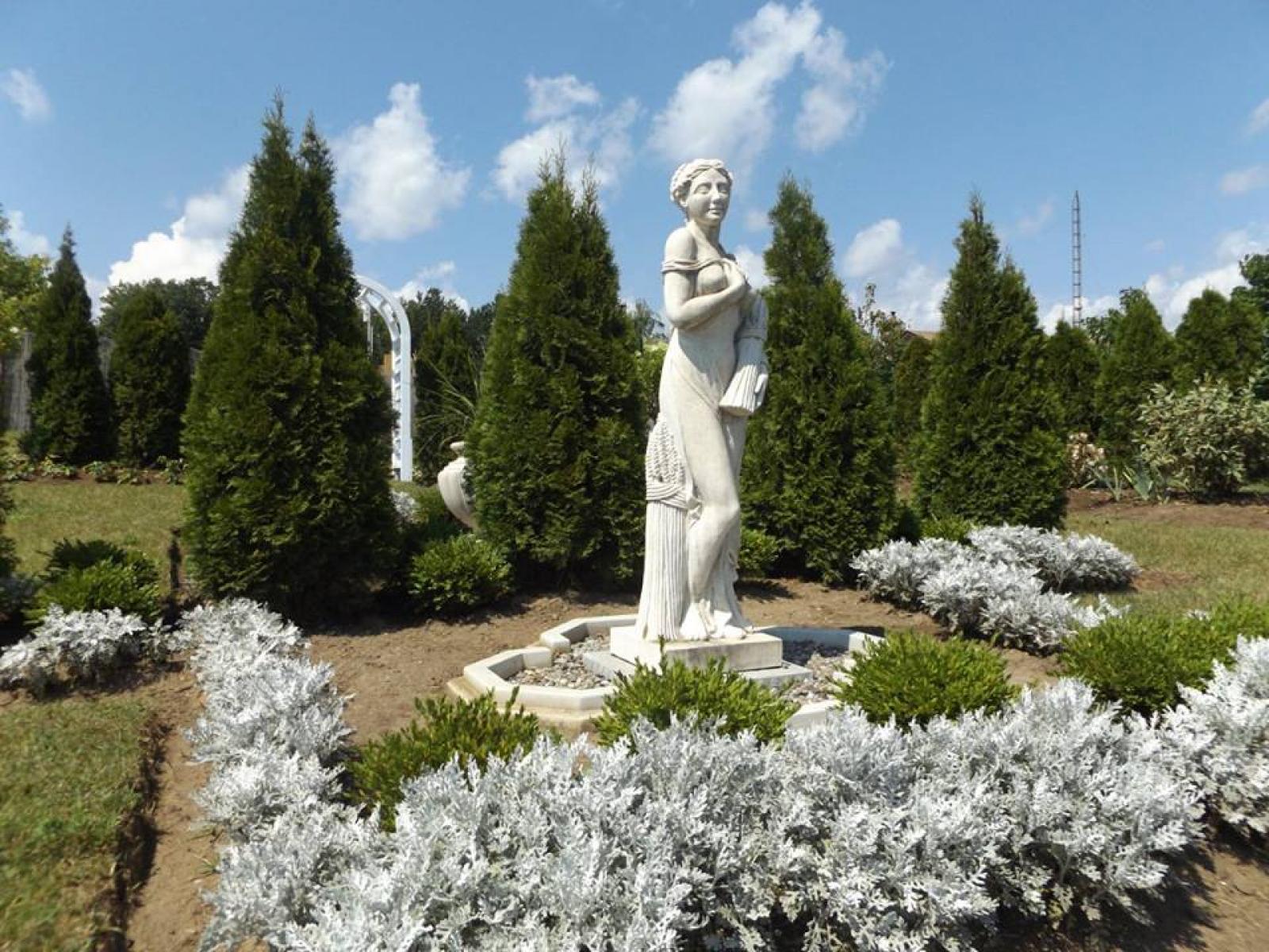 The White Garden features elegant statuary.