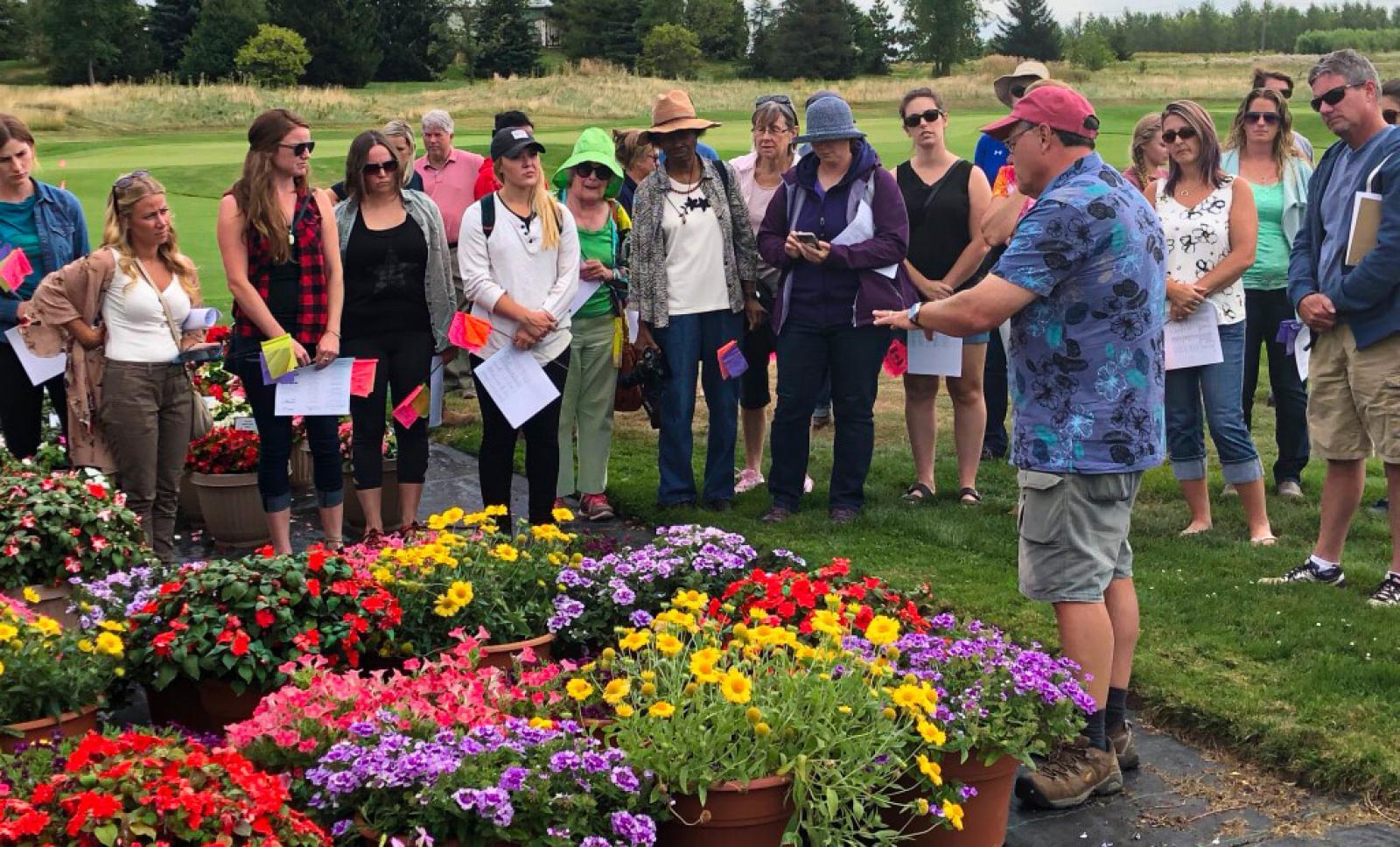Trial Garden Manager Rodger Tschanz, leads a tour of the Guelph site at this year's open house.